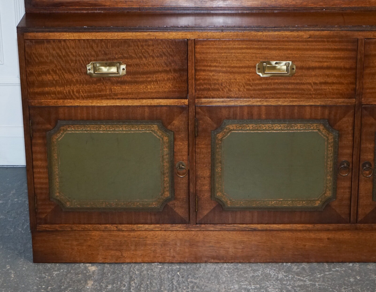 VINTAGE BEVAN FUNNELL MILITARY CAMPAIGN BOOKCASE WITH EMBOSSED LEATHER DOORS