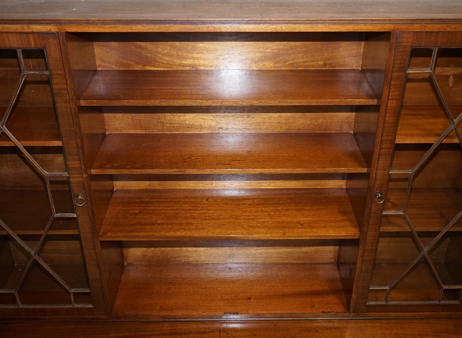 VINTAGE BEVAN FUNNELL MILITARY CAMPAIGN BOOKCASE WITH EMBOSSED LEATHER DOORS