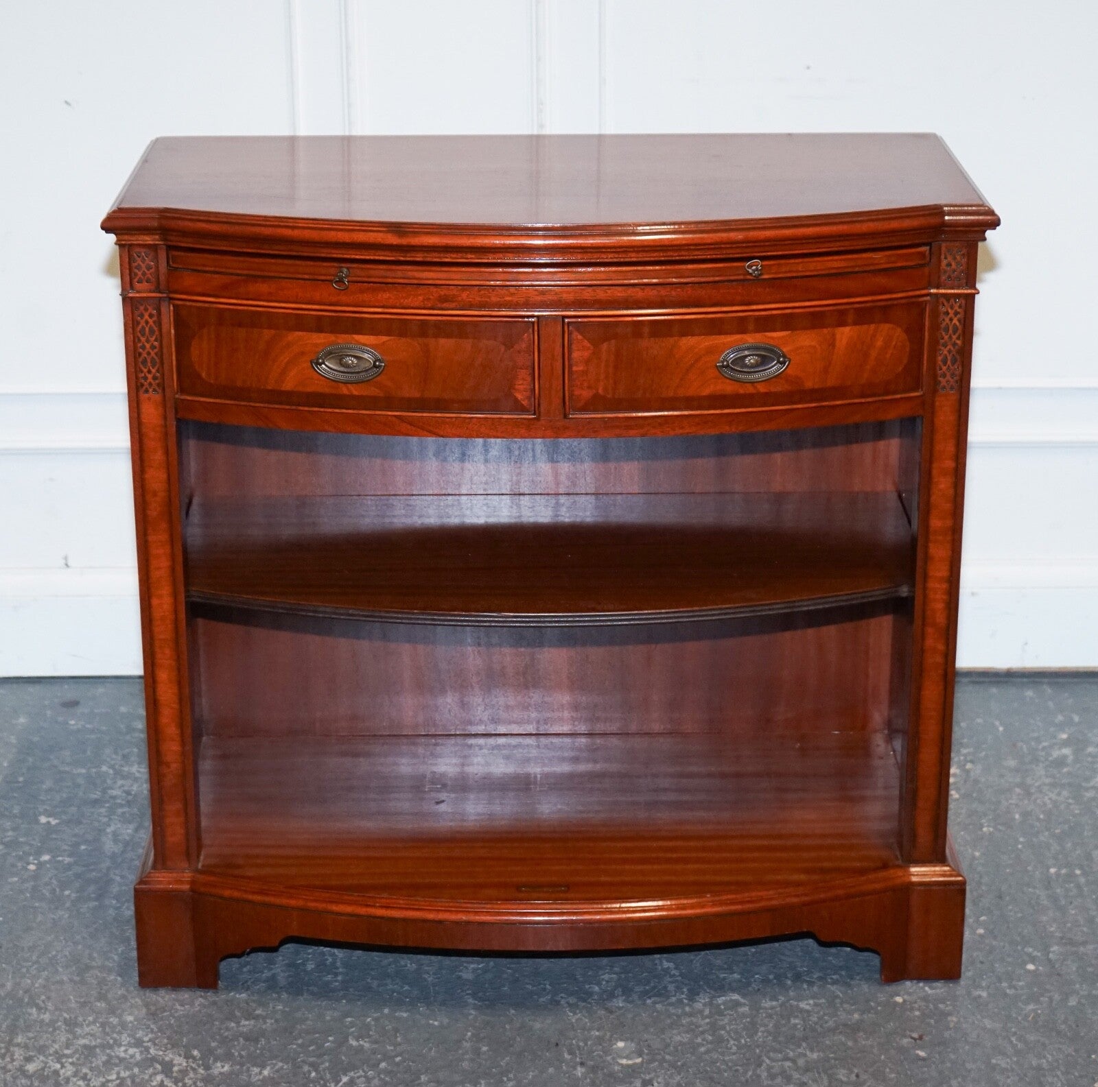 VINTAGE SERPENTINE BOW FRONT DWARF OPEN BOOKCASE WITH TWO DRAWERS BY WADE