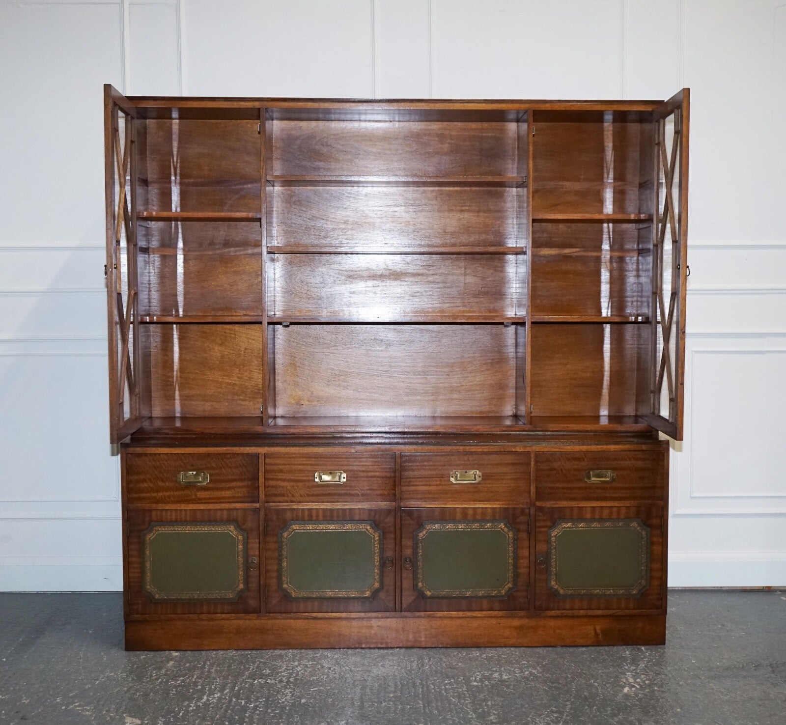 VINTAGE BEVAN FUNNELL MILITARY CAMPAIGN BOOKCASE WITH EMBOSSED LEATHER DOORS