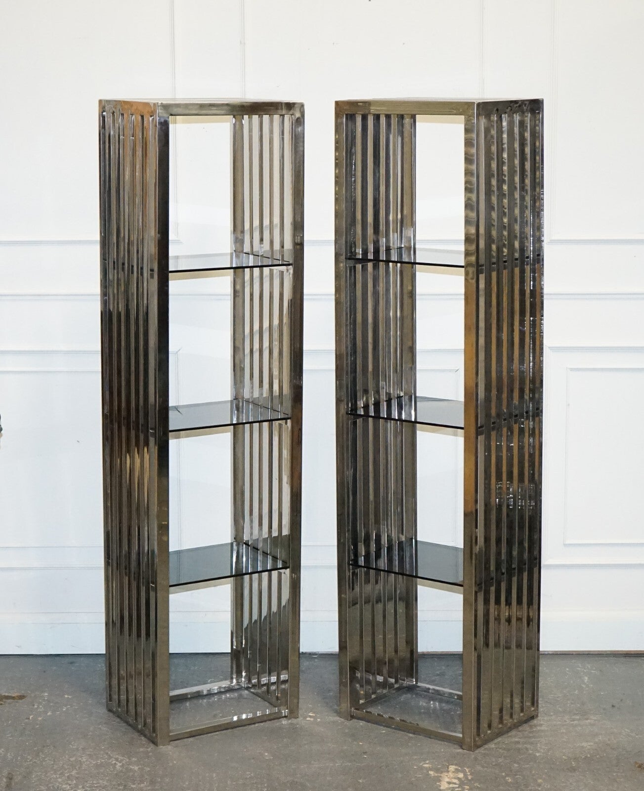 STUNNING CASA PADRINO STAINLESS STEEL PAIR OF BOOKCASES AND SMOKED GLASS SHELFS
