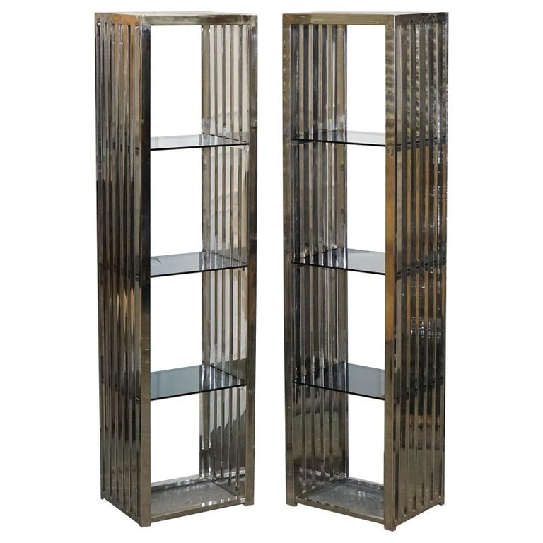 STUNNING CASA PADRINO STAINLESS STEEL PAIR OF BOOKCASES AND SMOKED GLASS SHELFS