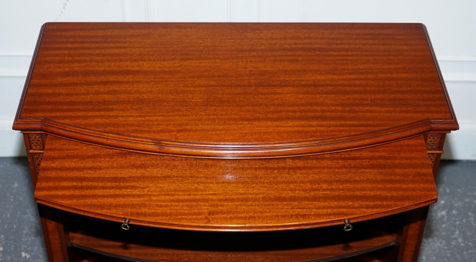 VINTAGE SERPENTINE BOW FRONT DWARF OPEN BOOKCASE WITH TWO DRAWERS BY WADE