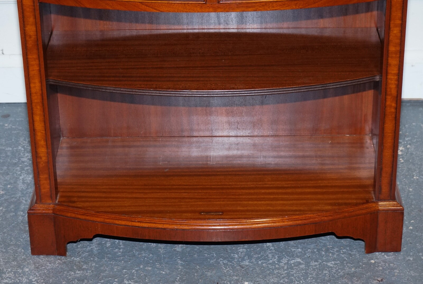 VINTAGE SERPENTINE BOW FRONT DWARF OPEN BOOKCASE WITH TWO DRAWERS BY WADE